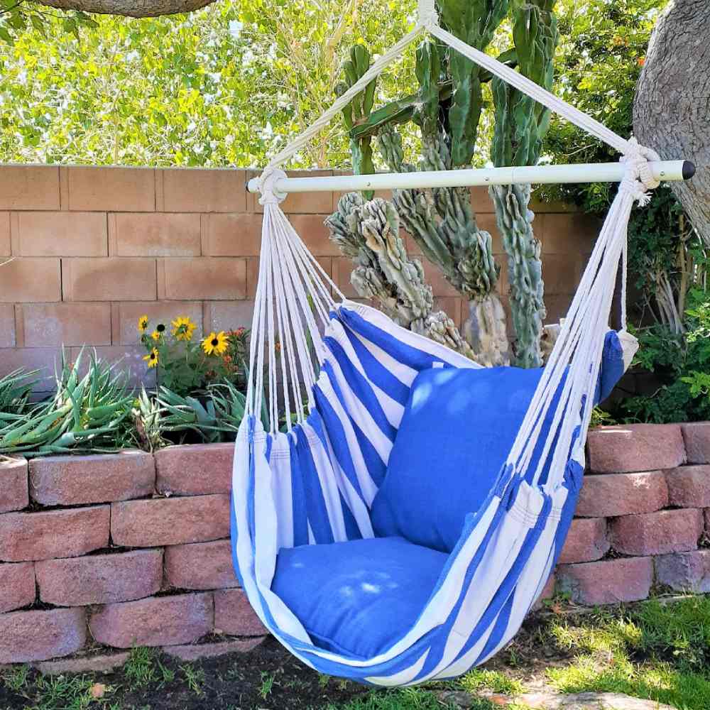 A hammock chair on its own freestanding frame